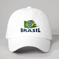 Detailed close-up of Brasil flag embroidery and lettering on white cotton baseball cap - Adjustable / White