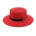 Close-up of a red woven straw boater hat with a black leather band and gold buckle detail - Red