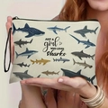 Pochette in tela bianco crema con illustrazioni di squali e cinturino da polso nero - Motivo a Squalo (Stile 2)