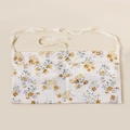 Detail view of the floral cotton baby organizer bag with soft muslin texture and ties - Abundant Flowers