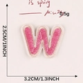 Pink embroidered letter W iron-on patch with beige border, size 2.5cm by 3.2cm - Letter-W