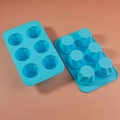 Detailed close-up of 6-cavity blue silicone mold with geometric faceted patterns - 6-Cavity Beveled Edge / Blue