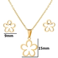 Golden flower jewelry set with镂空 earrings and necklace pendant on white background - Flower Gold