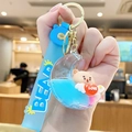 Blue crescent moon keychain with liquid, bear doll, and matching silicone wrist strap - Moon Bear - Blue