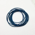 Detailed macro view of royal blue spring-style 1.7mm stainless steel wire bracelets - Dark Blue