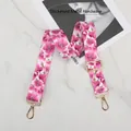 Close-up of pink floral pattern bag strap with thickened gold metal swivel hooks - Pink Large Flowers - Gold Buckle