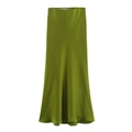 Detailed view of grass green satin skirt with smooth glossy texture and elegant drape - Light Green