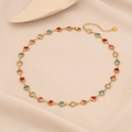 Golden necklace with heart-shaped red, blue and clear stones on beige fabric surface - 1# Multicolor