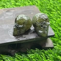 Set of two 2.8cm hand-carved dark green labradorite crystal skulls with polished finish - Labradorite