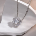 Silver heart pendant necklace with radiant colorful zircon halo on a stone display - White Zirconia Pendant (No Chain)