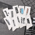 Streetwear style white cotton mid-calf socks with creative graphics on gray background - White (One of Each Style)