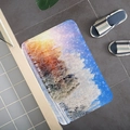 Detailed top-down view of winter snow forest printed absorbent flannel floor mat on tiles - Sunset Glow Snow Forest (5)