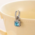 Silver square hoop earrings with sparkling blue center stone and diamond accents - Aquamarine