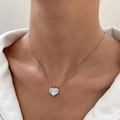 Elegant silver heart pendant necklace with snake chain worn on a female neck - Silver Snake Chain Heart (M-822)