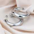 Polished silver chunky C-shaped hoop earrings on elegant champagne silk fabric background - 8.0*40mm / Steel