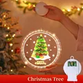 Hanging LED Christmas light with festive tree and gift pattern in a warm setting - Painted Christmas Tree