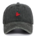 Close-up of strawberry embroidery detail on washed dark grey vintage cotton baseball cap - Army Green