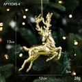 Golden reindeer Christmas ornament with mirrored finish hanging on festive tree - Leaping Deer