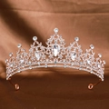 Elegant rose gold bridal tiara with sparkling crystals on brown silk background - Rose Gold