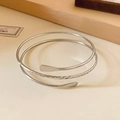 Three-layer silver spiral upper arm cuff with hammered texture and minimalist style - Silver Spiral Open Hammered Style