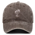 Detail of white coconut tree embroidery on a vintage washed cotton baseball cap - Coffee