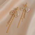 Elegant fishtail tassel earrings with rhinestones and faux pearls on silk background - Gold Fishtail Tassel Earrings (S925 Silver Pin)