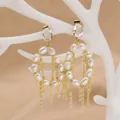 Vintage freshwater pearl earrings with crystal studs and elegant long gold tassels - Geometric Pearl Tassel Earrings