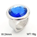 Anello in acciaio titanio dorato con grande gemma ovale in vetro blu, larghezza 24mm - US 9 / Argento con pietra blu