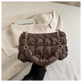 Detail of coffee quilted cloud bag with gold chain strap and soft pleated nylon texture - Coffee