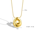 Detail view of gold bubble letter necklace with dimensions 21mm x 17mm and 45cm chain - Letter O
