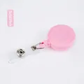 Retractable badge holder in solid pink finish with transparent PVC strap and metal clip - Pink