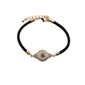 Detail of adjustable evil eye woven bracelet with blue zircon and gold lobster clasp - CB00209 Oval Eye / Black