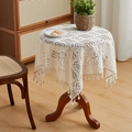 White lace knitted tablecloth with fringe tassels on round wood table for home decor - 90*90cm / Beige