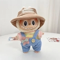 Labubu plush doll in blue corduroy overalls and khaki bucket hat with a stylish outfit - Light Blue Overalls With Star Pattern + Small Brown Hat / First And Second Generation Keychains Are Compatible With La Cloth Dolls. Dolls Not Included.
