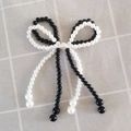 Elegant bow-shaped shoe buckle accessory featuring black and white beaded pearl layers - Black and White Double Bow