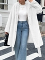 Elegant white faux fur long coat with belt for women in a stylish outdoor street style look - S / White