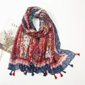 Floral cotton linen scarf with ethnic prints and bohemian tassels in a flat lay view - Colorful Ethnic Totem (XB103)