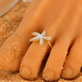 Adjustable golden starfish toe ring with white enamel for summer beach wear - White Starfish (3341)