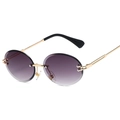 Randlose ovale Sonnenbrille mit lila Verlaufsgläsern und elegantem Goldmetallrahmen - Goldener Rahmen Doppelt Grau
