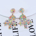 Detalle de pendientes de bastón de caramelo con cuentas de colores y lazo de perla - Bastón de Caramelo con Diamantes de Imitación Multicolor y Lazo