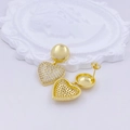 Detail of heart-shaped earrings in gold finish with micro-set sparkling white zircons - Heart Round Base Zirconia Earrings