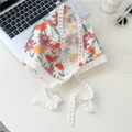 Floral cotton linen headscarf with white lace trim and ties on a minimalist desk - Coneflower