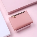 Pink short folding wallet with gold zipper detail on matching geometric pink base - Pink (No Buckle)