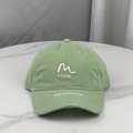 Detail of embroidered letters and distressed ripped brim on the cotton baseball cap - Light Green