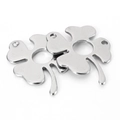 Macro shot of two silver four-leaf clover charms made of polished stainless steel metal - Metal Four Leaf Clover Pendant 24mmx32mm