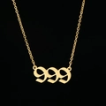 Gold stainless steel 999 angel number pendant necklace with gothic font on black background - 999 Gold