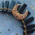 Detail of handmade gold crescent moon crown with black stone wrap and intricate wire craft - Gold Headband/Large Gold Moon/Obsidian Crystal