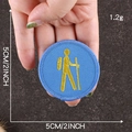 Round 5cm blue hiking patch with yellow silhouette embroidery for outdoor gear - Blue Hiking