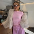 Detail of pink t-shirt with rhinestone shell pattern layered under a faux fur jacket - S / Pink