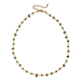 Detail of colorful irregular natural stones and golden beads on a handmade boho necklace - Deep Color